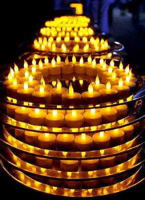 Pretty sight: The LED candles used to usher in the new Buddha year add uniqueness to the celebrations. image002.jpg